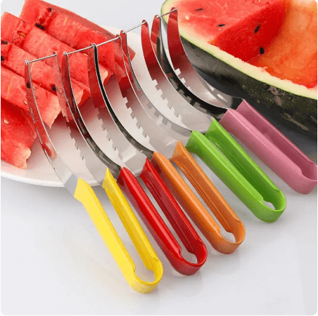 Colorful watermelon slicers with ergonomic handles beside sliced and whole watermelon