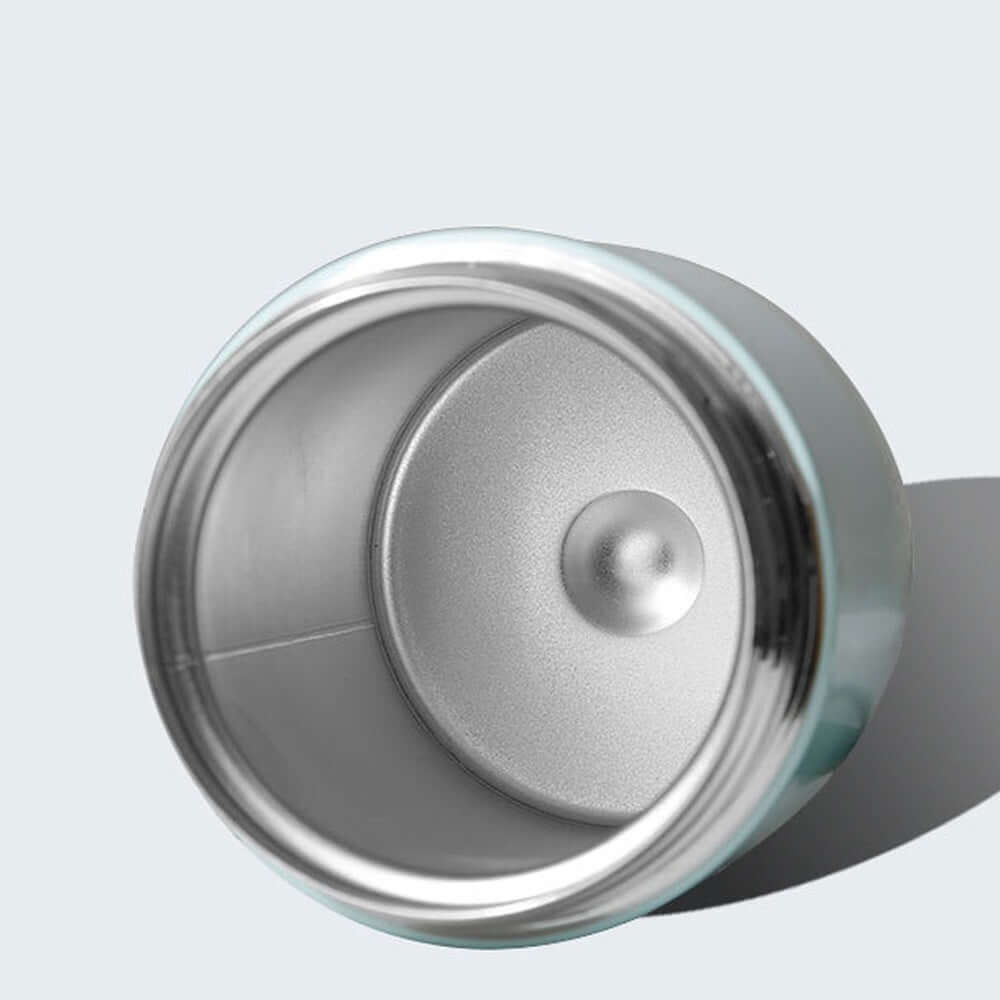 Open stainless steel kitchen container with silver interior on a light background