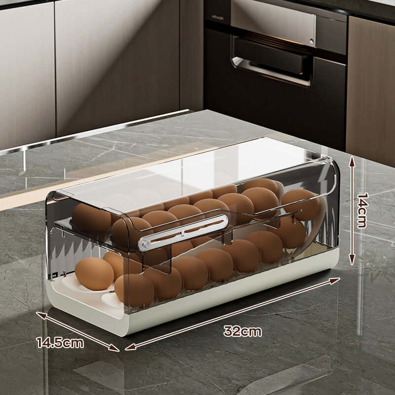 Clear plastic egg storage box on kitchen counter with brown eggs, labeled dimensions 32x14.5x14cm
