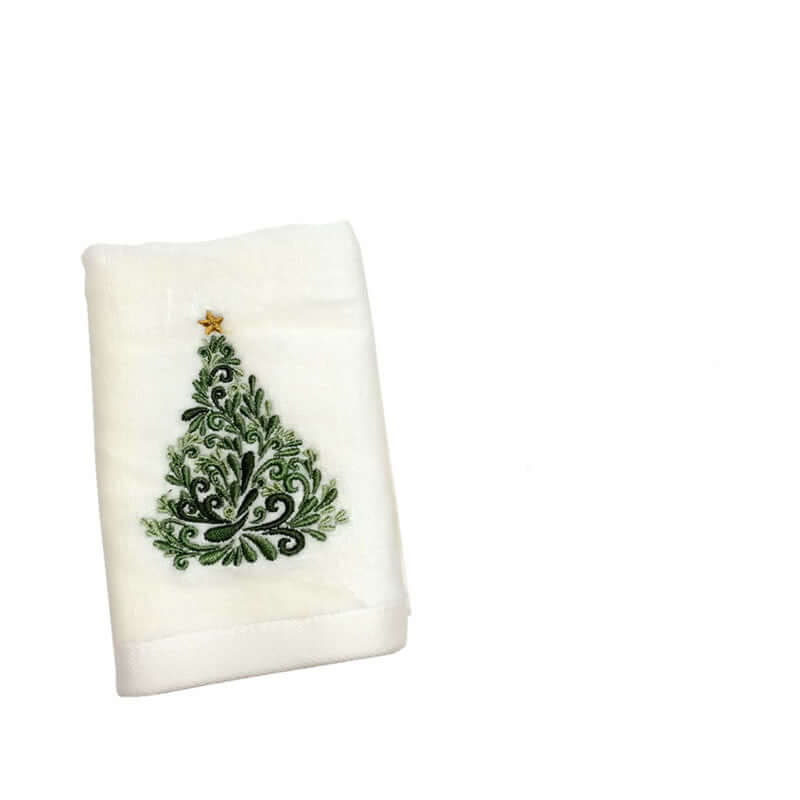 White kitchen towel with embroidered green Christmas tree and gold star design