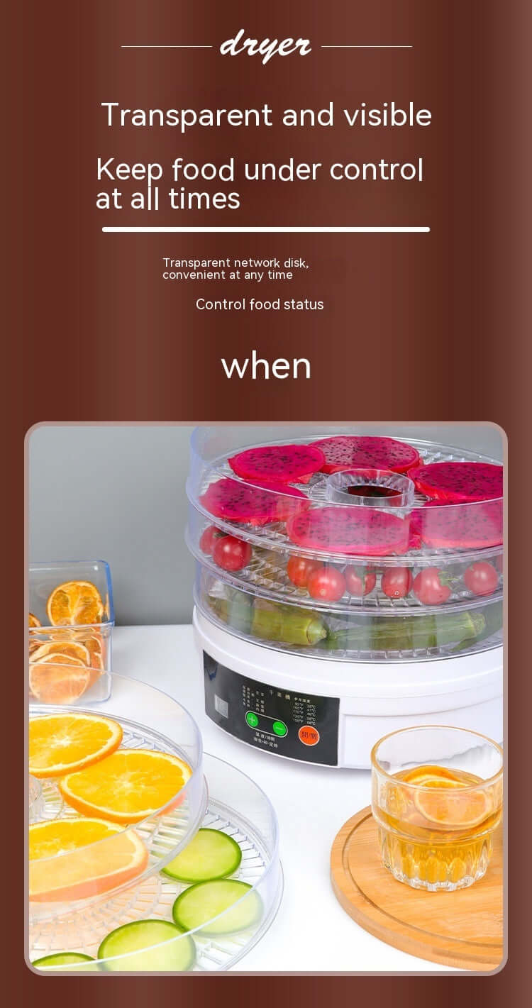 Food dehydrator with transparent trays drying fruits and vegetables on a kitchen counter