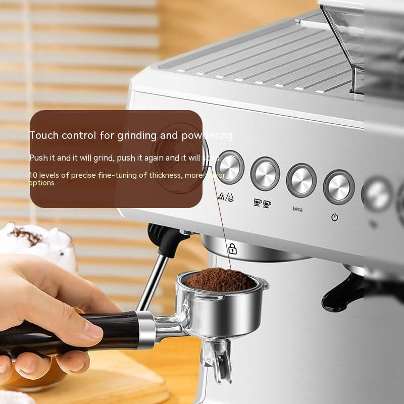 Espresso machine with touch controls grinding fresh coffee into a portafilter in a kitchen setting.
