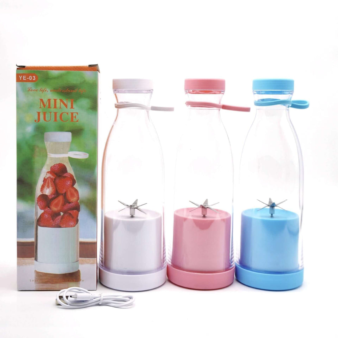 Three portable mini juicers in white, pink, and blue with a product box and USB charging cable