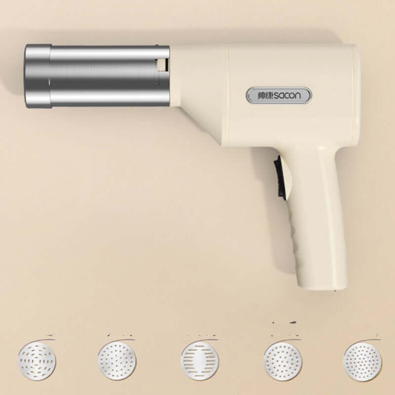 Handheld kitchen torch with multiple interchangeable burner heads on beige background.