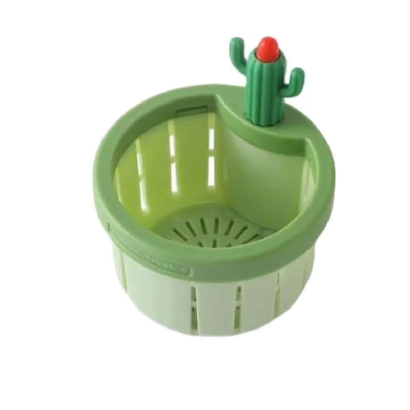Green kitchen sink strainer basket with cactus handle, plastic, drain holes visible.
