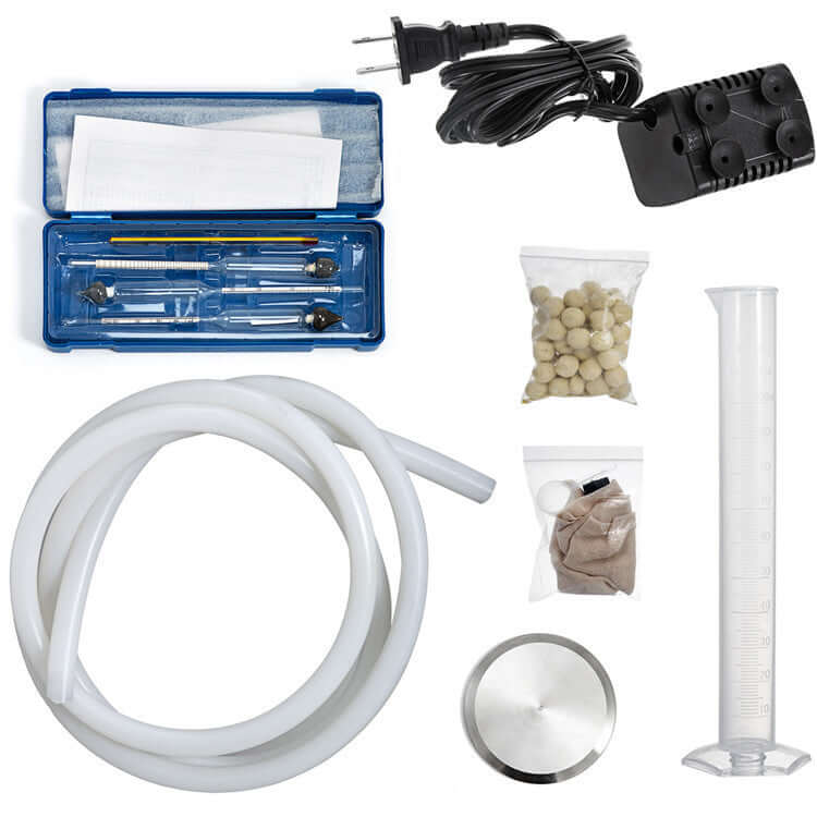 DIY kitchen filtration system kit with tubing, pump, measuring cylinder, and accessories