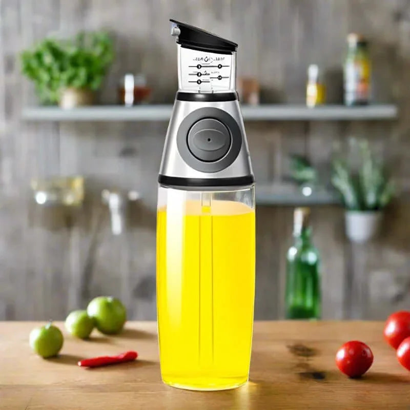 Oil dispenser bottle with measuring cup on kitchen counter, salad ingredients in background
