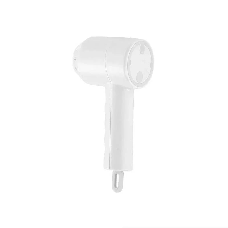 White handheld electric lint remover with ergonomic handle on white background