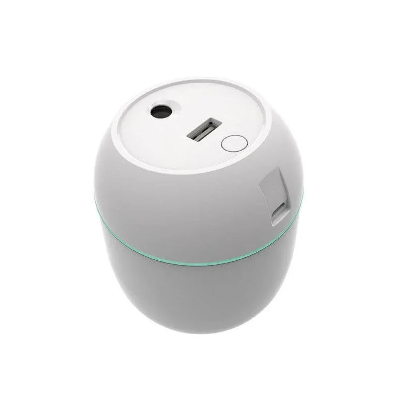 White portable kitchen gadget with USB port and round design on white background