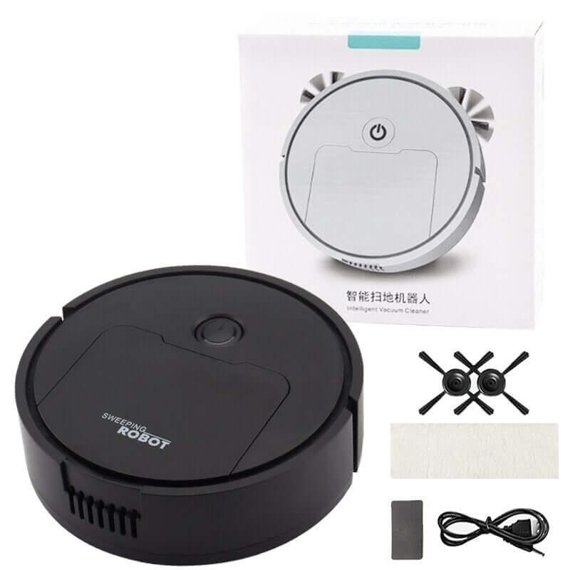 Black robot vacuum cleaner with box, accessories, and charging cable for kitchen floors
