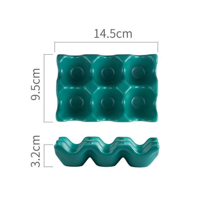Green plastic egg holder tray for 6 eggs, with measurements in centimeters shown.