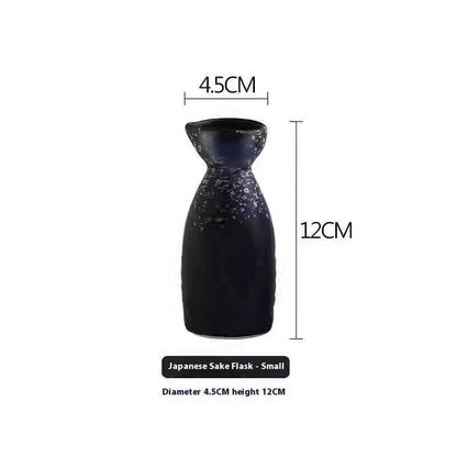 Small black Japanese sake flask, 12cm tall, 4.5cm diameter, kitchen accessory.
