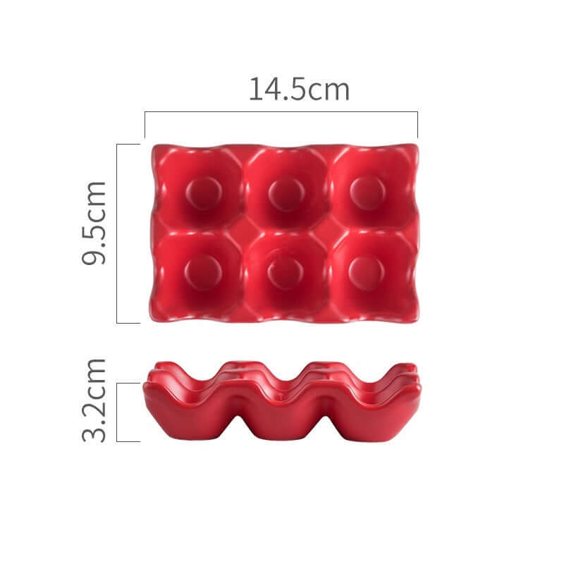 Red ceramic egg holder tray with six compartments, dimensions 14.5cm x 9.5cm x 3.2cm, kitchen accessory.