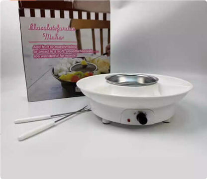 Electric chocolate fondue maker with forks and packaging, ideal for kitchen dessert parties