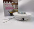 Electric chocolate fondue maker with forks and packaging, ideal for kitchen dessert parties