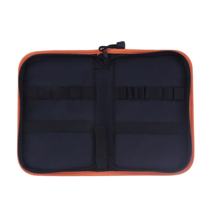 Open orange and black zippered kitchen utensil storage case with elastic straps
