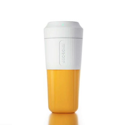 Yellow and white portable kitchen blender cup on a white background