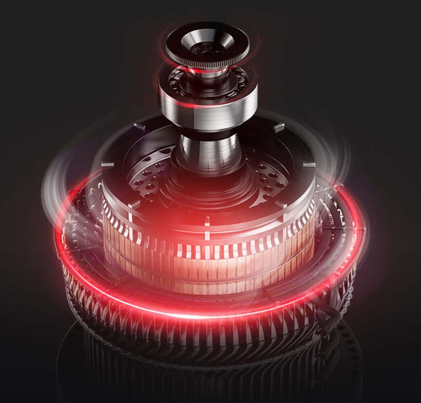 Close-up of a high-speed kitchen appliance motor with metallic gears and glowing red ring