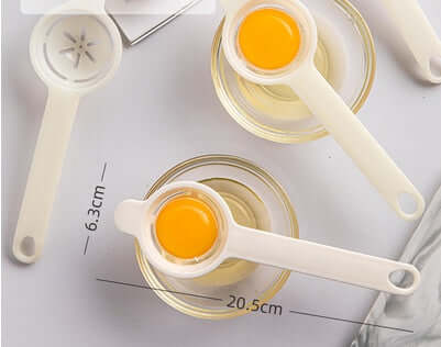 Plastic egg separator kitchen tool shown separating egg yolk from egg white over a glass bowl