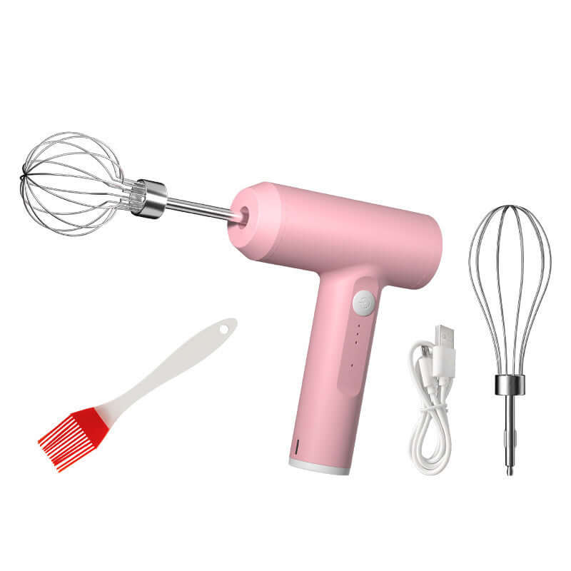 Pink handheld electric mixer with whisk attachments, silicone brush, and USB charging cable