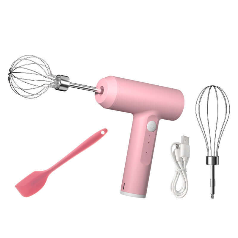 Pink electric hand mixer with whisk attachments, silicone spatula, and USB charging cable