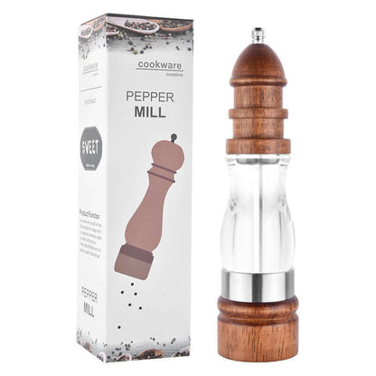 Wood and clear acrylic pepper mill with product box for kitchen seasoning.