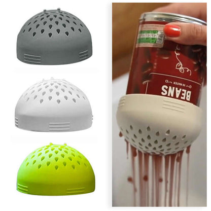 Silicone can strainer in gray, white, green shown draining liquid from a bean can, kitchen accessory