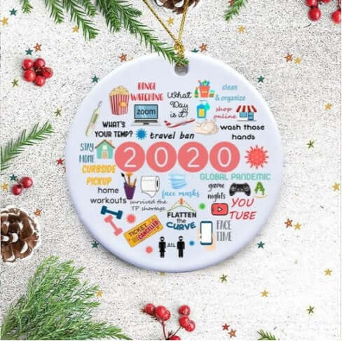 2020 themed Christmas ornament with pandemic icons, text, pinecones, and festive decor