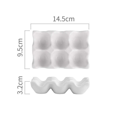 White ceramic egg holder with six slots, dimensions 14.5x9.5x3.2 cm, kitchen organizer