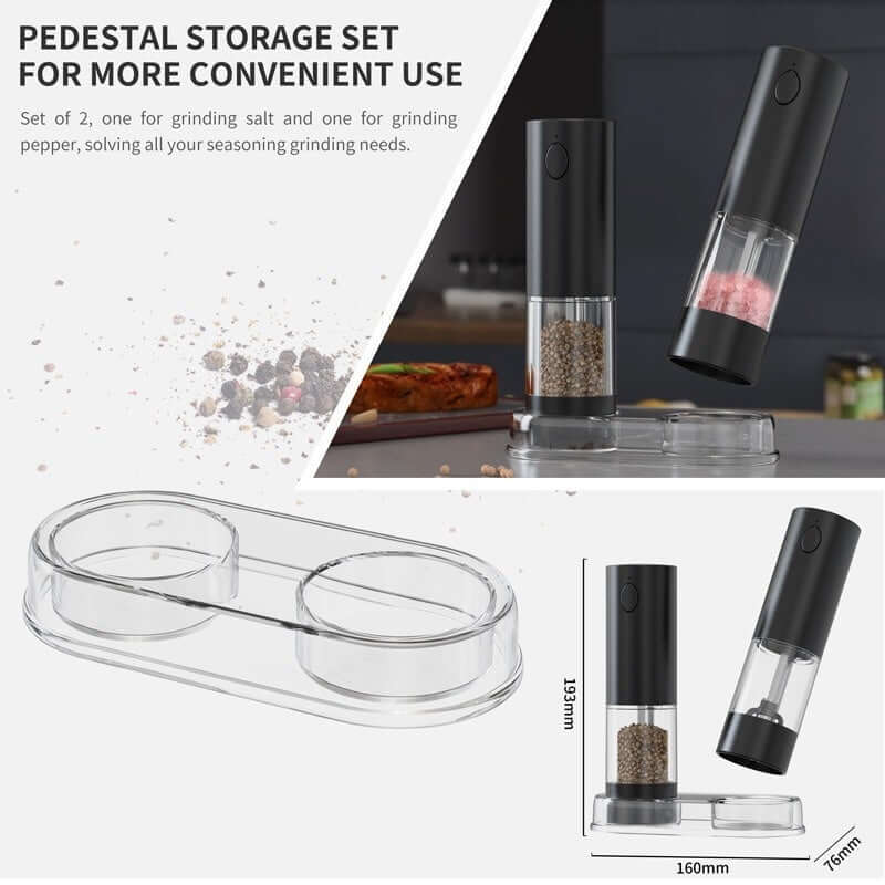 Electric salt and pepper grinder set with black finish and clear pedestal storage tray for kitchen.