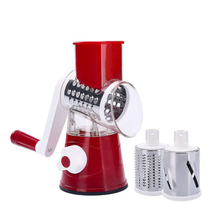 Red rotary cheese grater with three stainless steel drum attachments for kitchen use