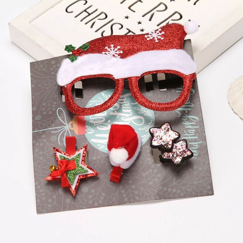 Christmas-themed accessories set with red glitter glasses, Santa hat clip, star hairpins, and festive star clip.