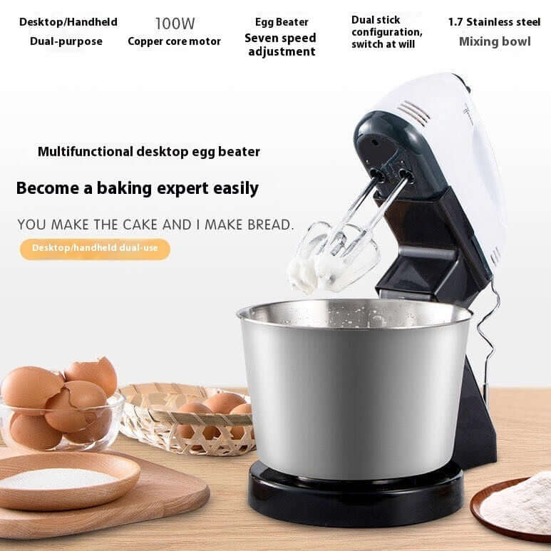 Desktop egg beater mixer with stainless steel mixing bowl and baking ingredients on table