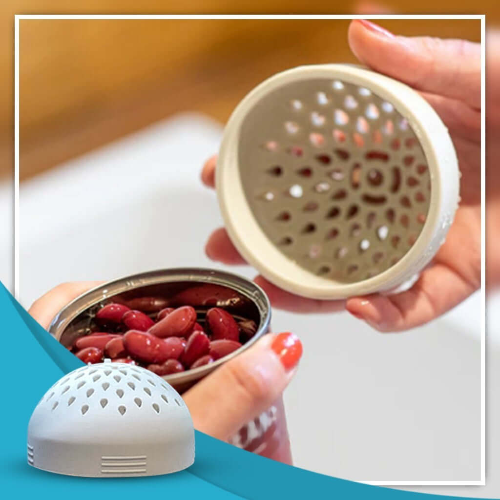 Plastic can strainer kitchen accessory being used to drain beans from opened can