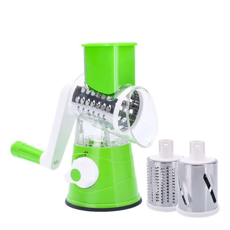 Manual rotary vegetable slicer with three stainless steel drum blades, green and white kitchen accessory