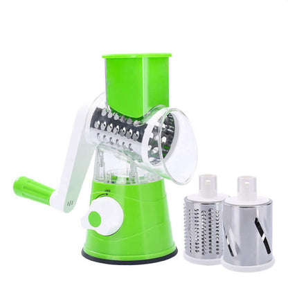 Manual rotary vegetable slicer with three stainless steel drum blades, green and white kitchen accessory