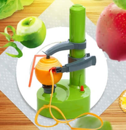 Automatic fruit and vegetable peeler with apples and peel, kitchen accessory tool