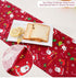 Cotton Christmas table runner with Santa print on dining table, bread and lemon slices on plate