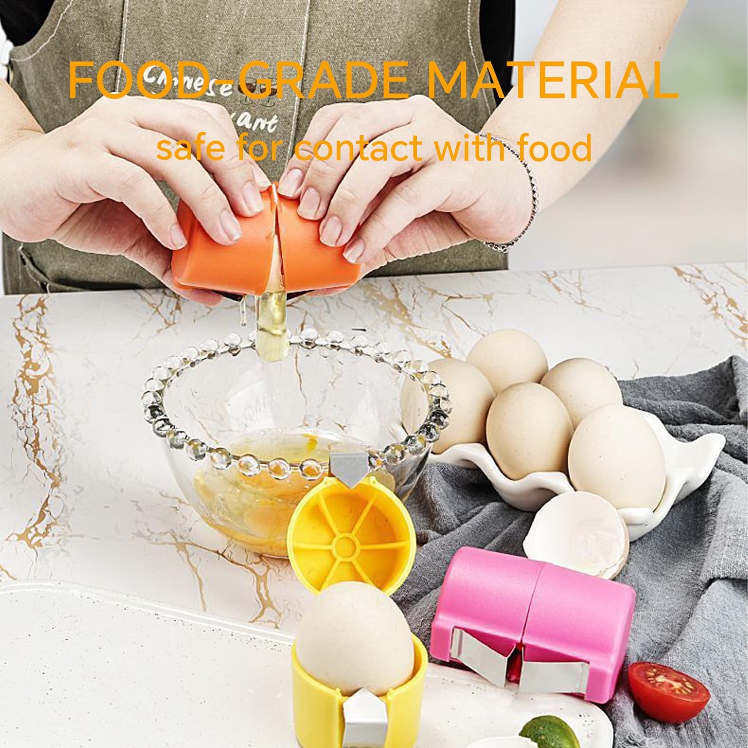 Egg cracker kitchen tool cracking eggs over a glass bowl on marble countertop with fresh eggs.