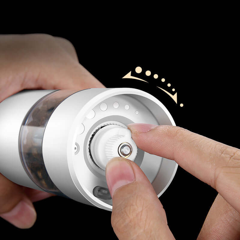 Adjusting grind size on electric pepper grinder kitchen accessory