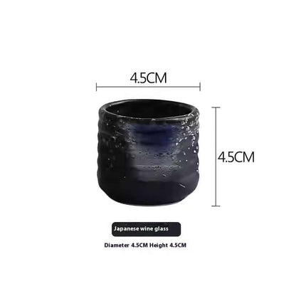 Small black Japanese wine glass with textured design, 4.5cm diameter and height