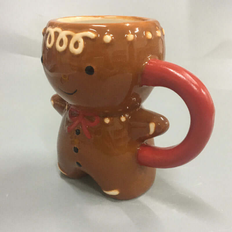 Gingerbread man novelty ceramic mug with red handle, kitchen gift idea