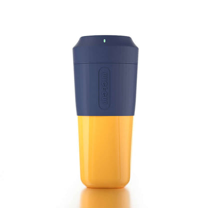 Yellow and navy blue insulated travel coffee mug with secure lid on white background