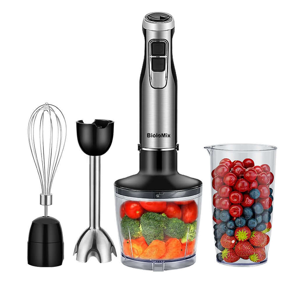 Immersion hand blender set with whisk, blending attachments, and cups of fresh fruits and vegetables