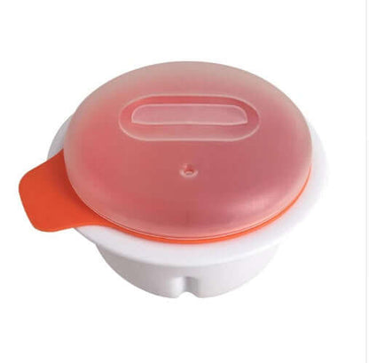 Plastic microwave egg cooker with orange handle and translucent lid on white background