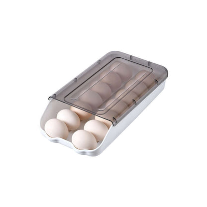 Egg storage container with transparent lid holding white eggs, kitchen organizer accessory
