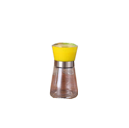 Glass spice jar with yellow lid and stainless steel band for kitchen storage
