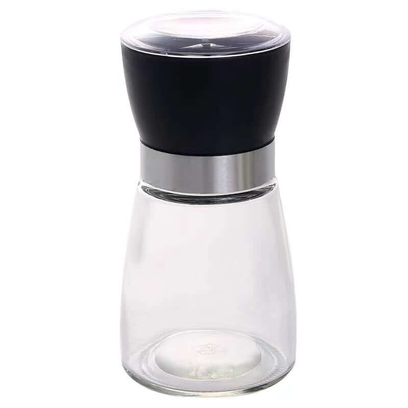 Modern glass and stainless steel spice grinder with black top for kitchen use