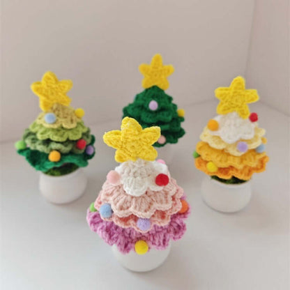 Colorful crochet Christmas tree decorations with star toppers in small pots