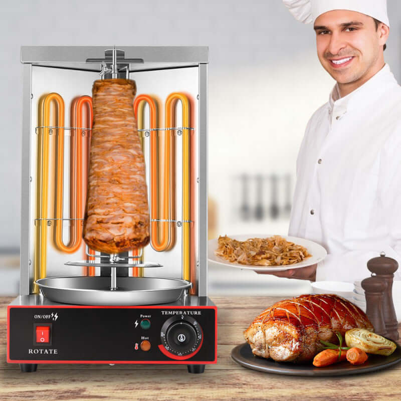 Vertical rotisserie grill for shawarma or kebab on kitchen counter with chef and cooked meat.